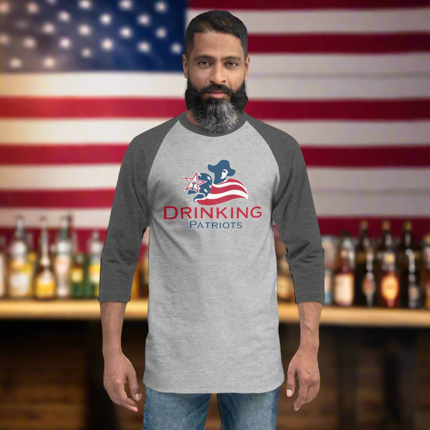 Man wearing a 3/4 sleeve raglan shirt with a Drinking Patriots logo